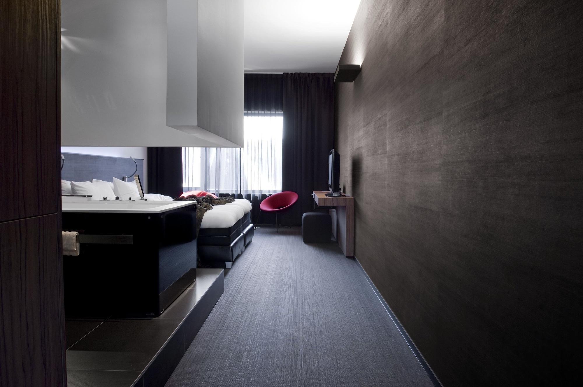 Carbon Hotel Genk Quarto foto